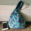 Medium sized Reversible Japanese Knot Bag with Turquoise Tiny Blossoms Handbag