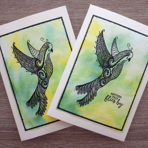 Another year flies by, pack of 2 cards, flying bird parrot, blank inside