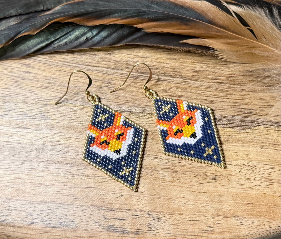 Beadwork fox earrings in orange and cream tones