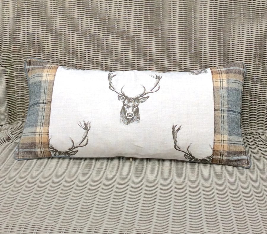 Stag and tartan cushion. Deer fabric and tartan pillow. Wool plaid bolster.