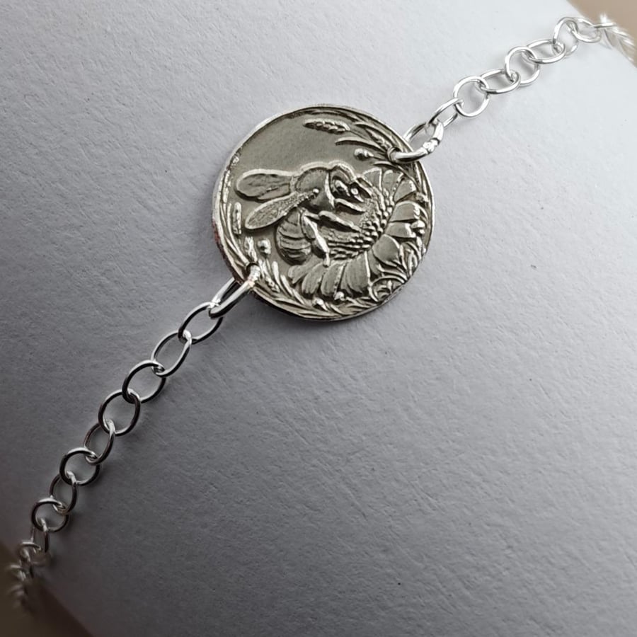 Image of Bee Engraved Sterling Silver Coin Bracelet