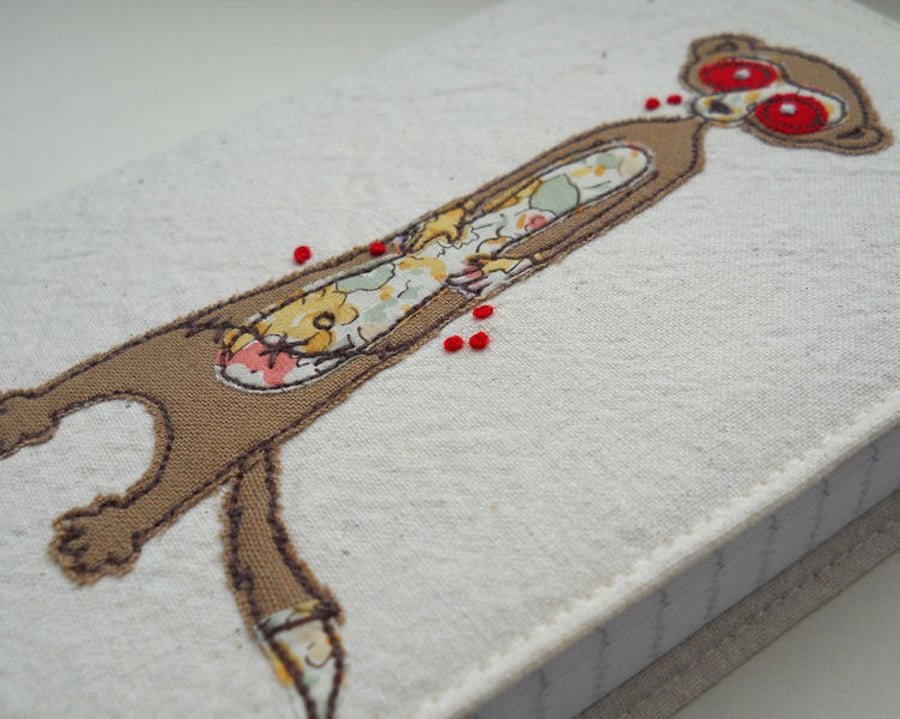 embroidered zombie meerkat notebook