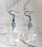 Aguamarine and shell hibiscus hanging earrings - Image 3