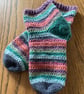 A pair of crochet warm and colourful stripy ankle socks in UK size 5-6