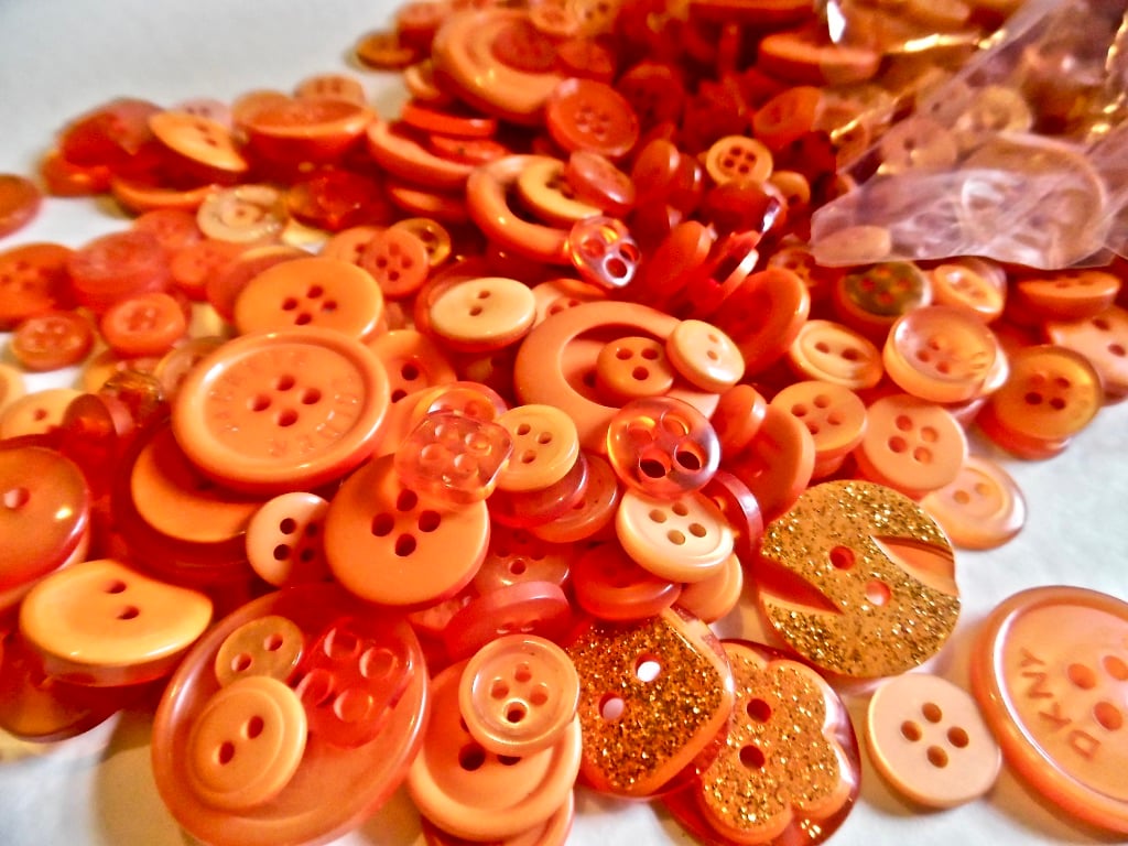 Bumper Bag of 650 Resin Mixed Size Orange Buttons