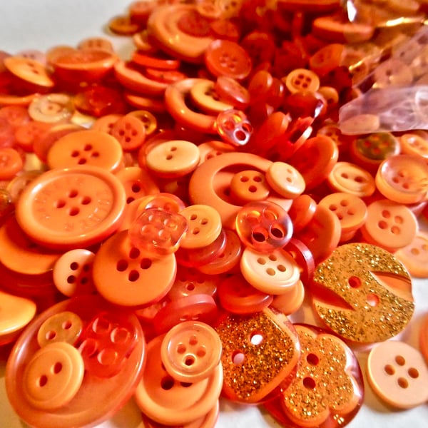 Bumper Bag of 650 Resin Mixed Size Orange Buttons