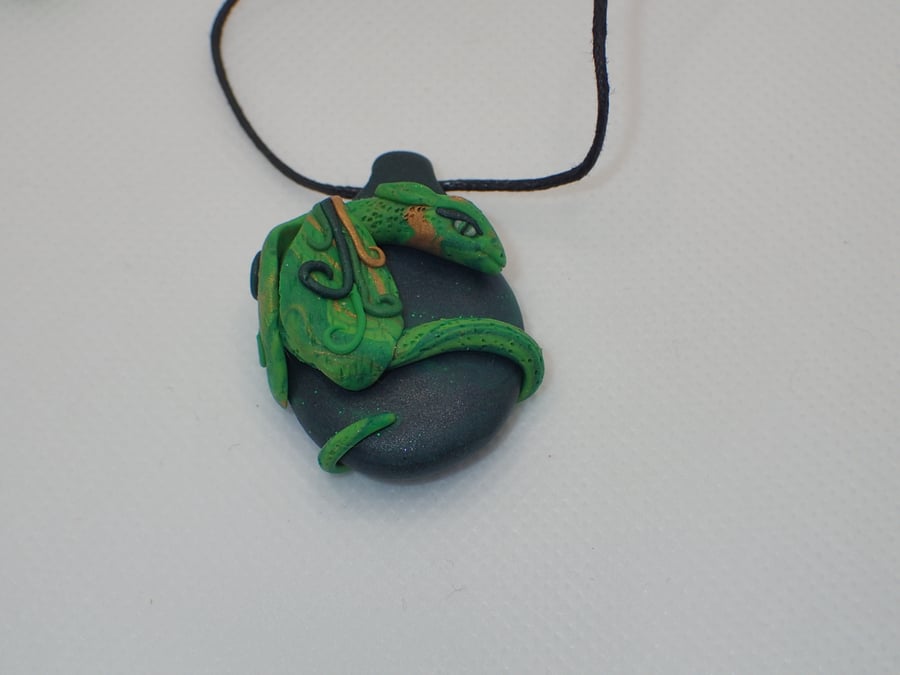 Green polymer clay dragon pendant