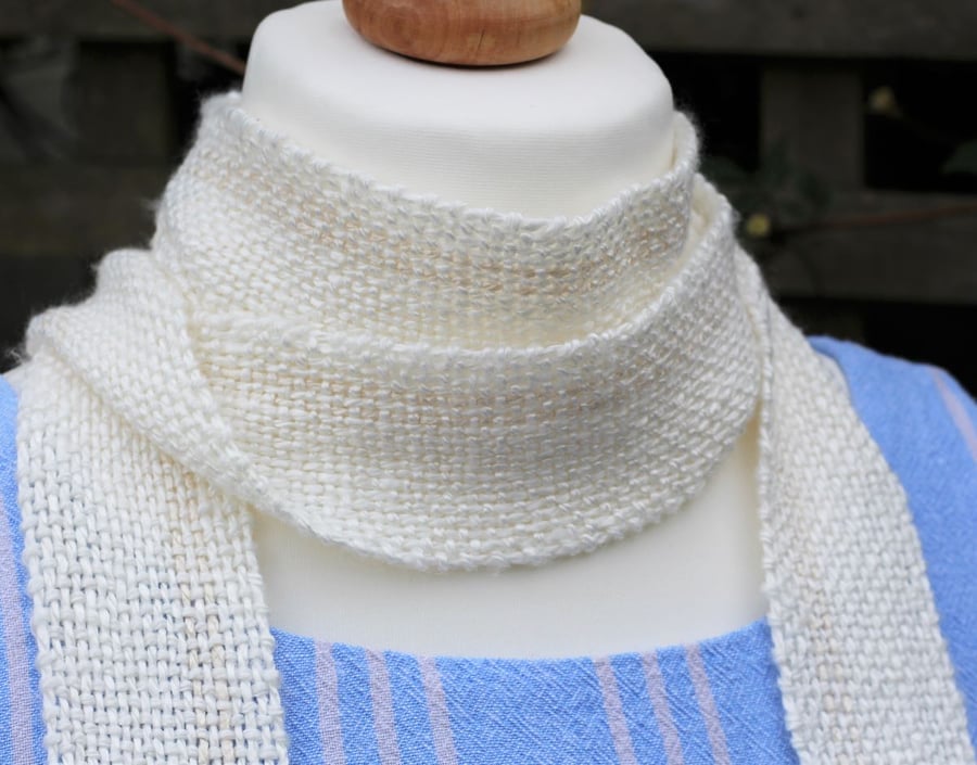 White handwoven scarf from handspun plant fibres