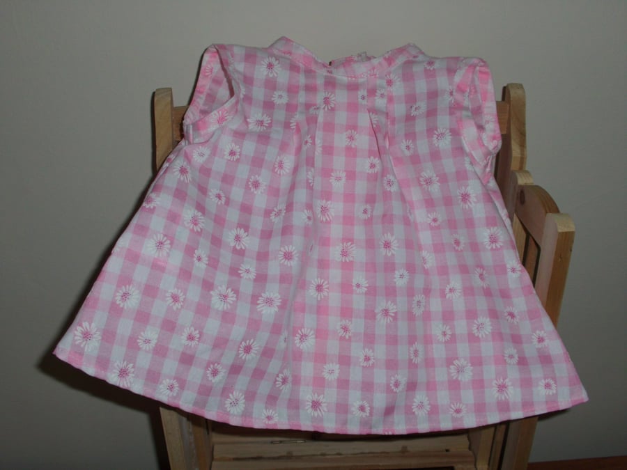 Baby girl pink gingham and daisy dress and pants set 