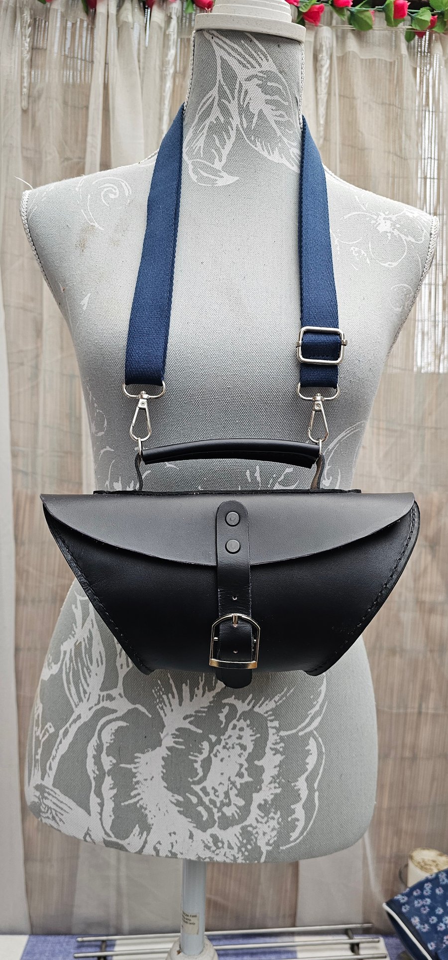 Small dark blue hand bag