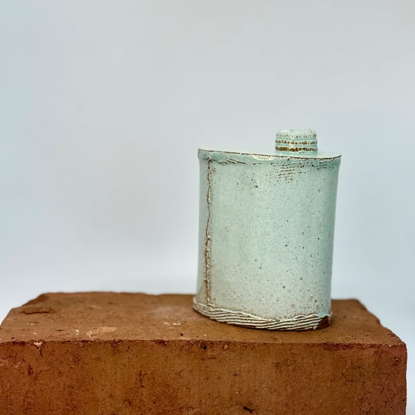 Hand built blue-green bud vase. No 1