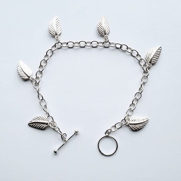 925 Sterling Silver Charm Bracelet Complete With Six Leaf Charms Length 7.5 Inch