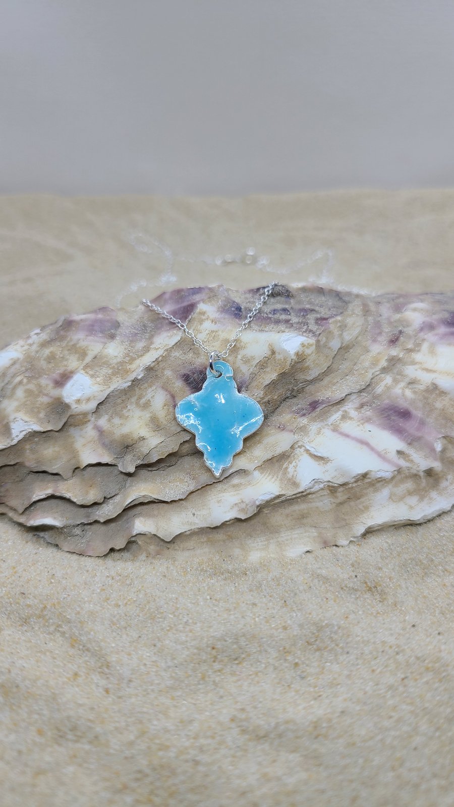 Pale blue enamelled silver bauble pendant