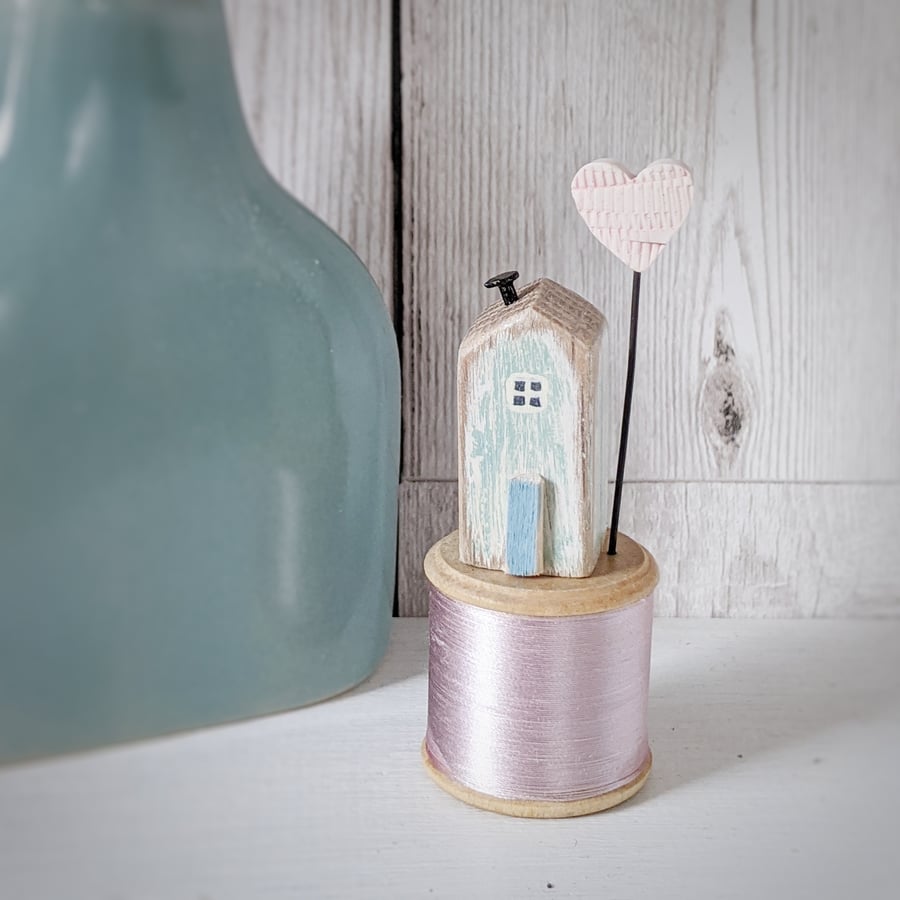 Wooden House on a Vintage Bobbin with a Clay Love Heart 