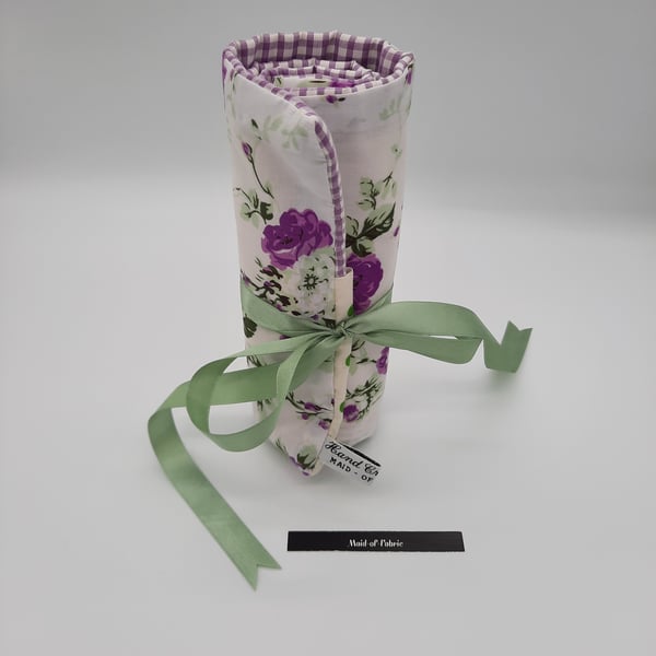 Make up wrap,  white and purple floral, green polkadot lining.