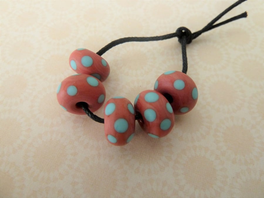 handmade lampwork glass beads, coral and blue spots