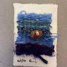 Beaded miniature weaving on card 5 of 10