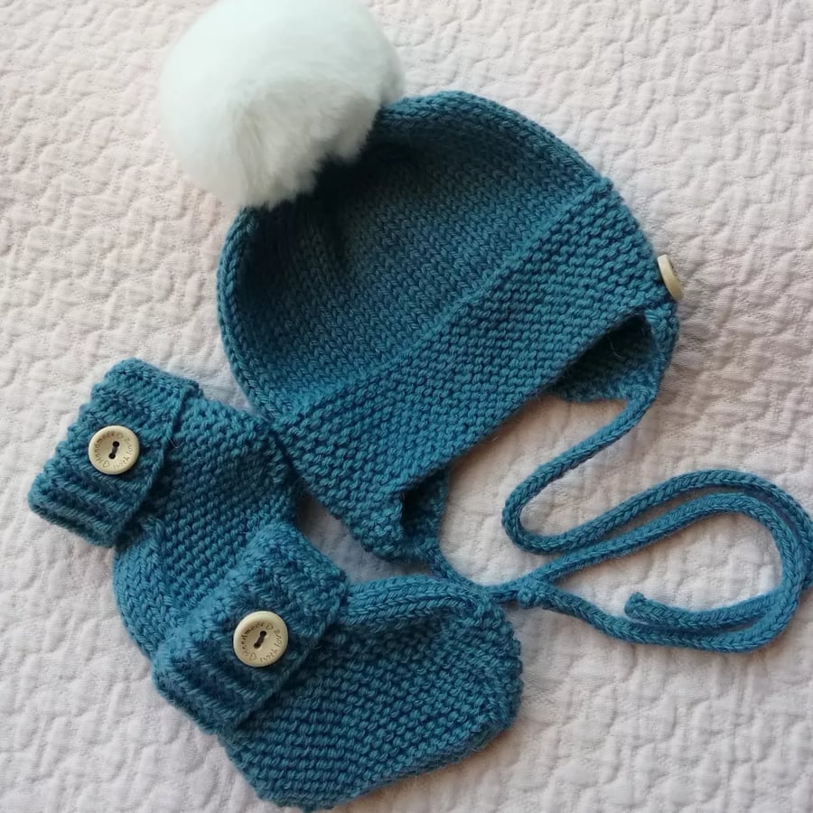 Hand knitted baby hat, bonnet, helmet 