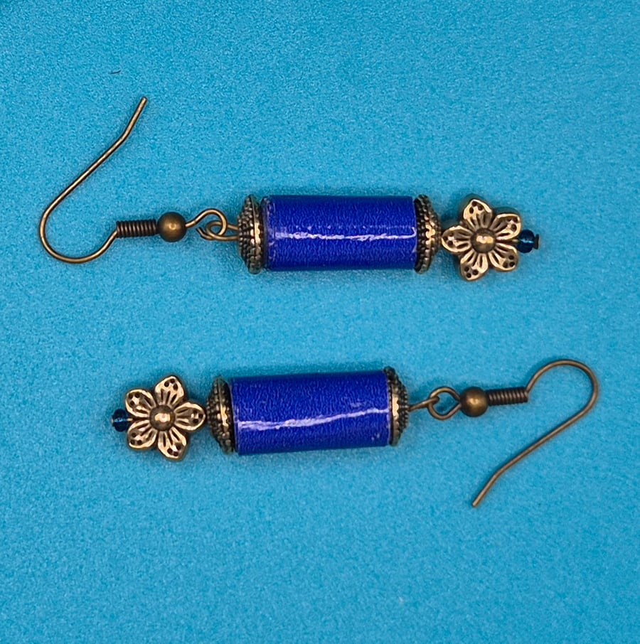 Midnight blue handmade paper beaded earrings with bronze tone flower bead