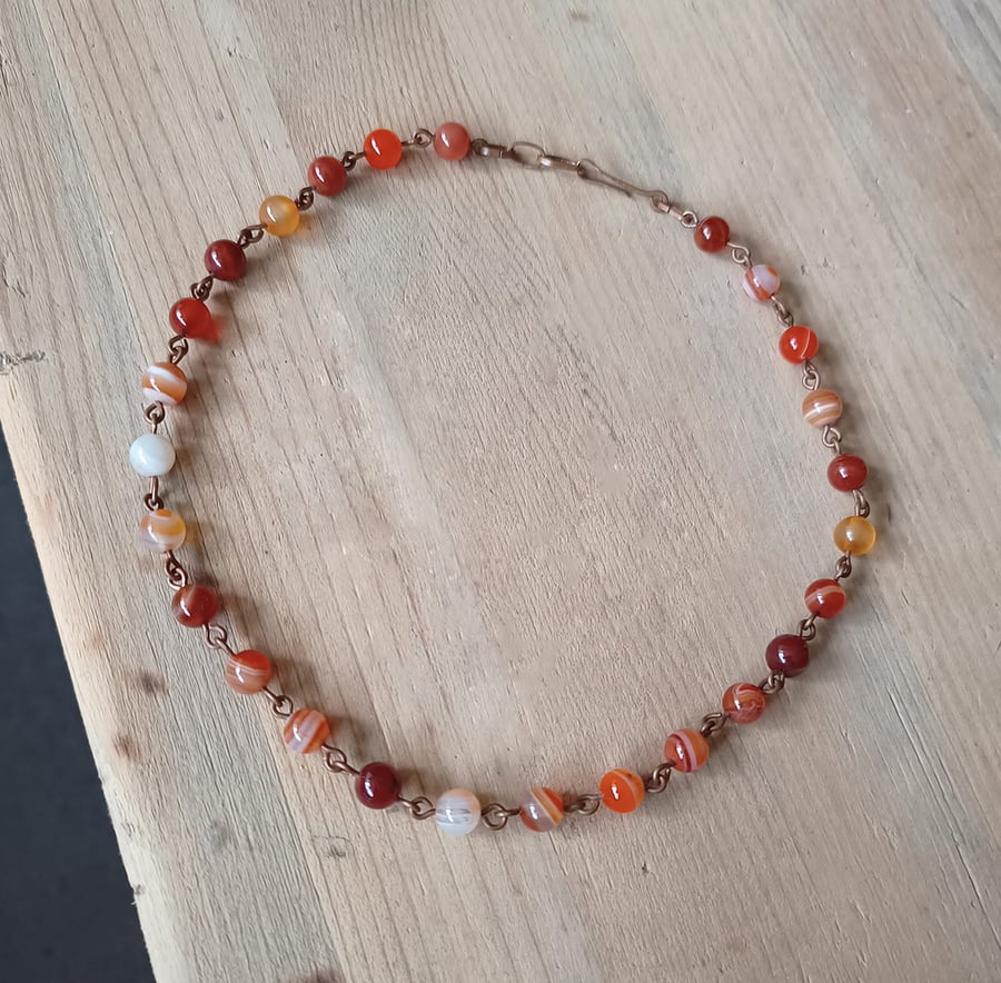 Copper necklace with orange agate