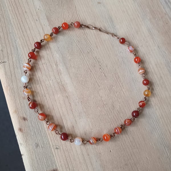 Copper necklace with orange agate