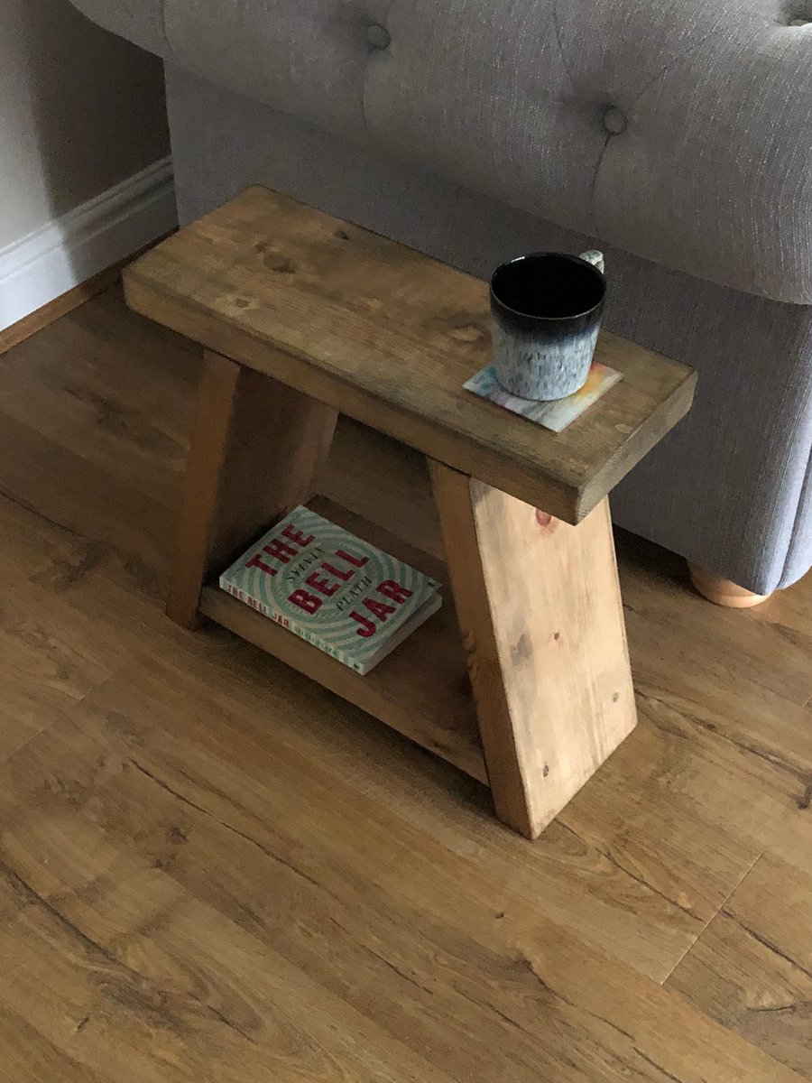 A framed Solid Wooden side end table with a rustic oak finish hand built