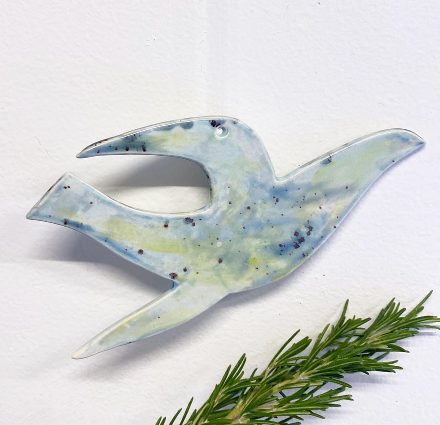 Hand made bird ceramic decoration- hand glazed in blues and greens 16cm