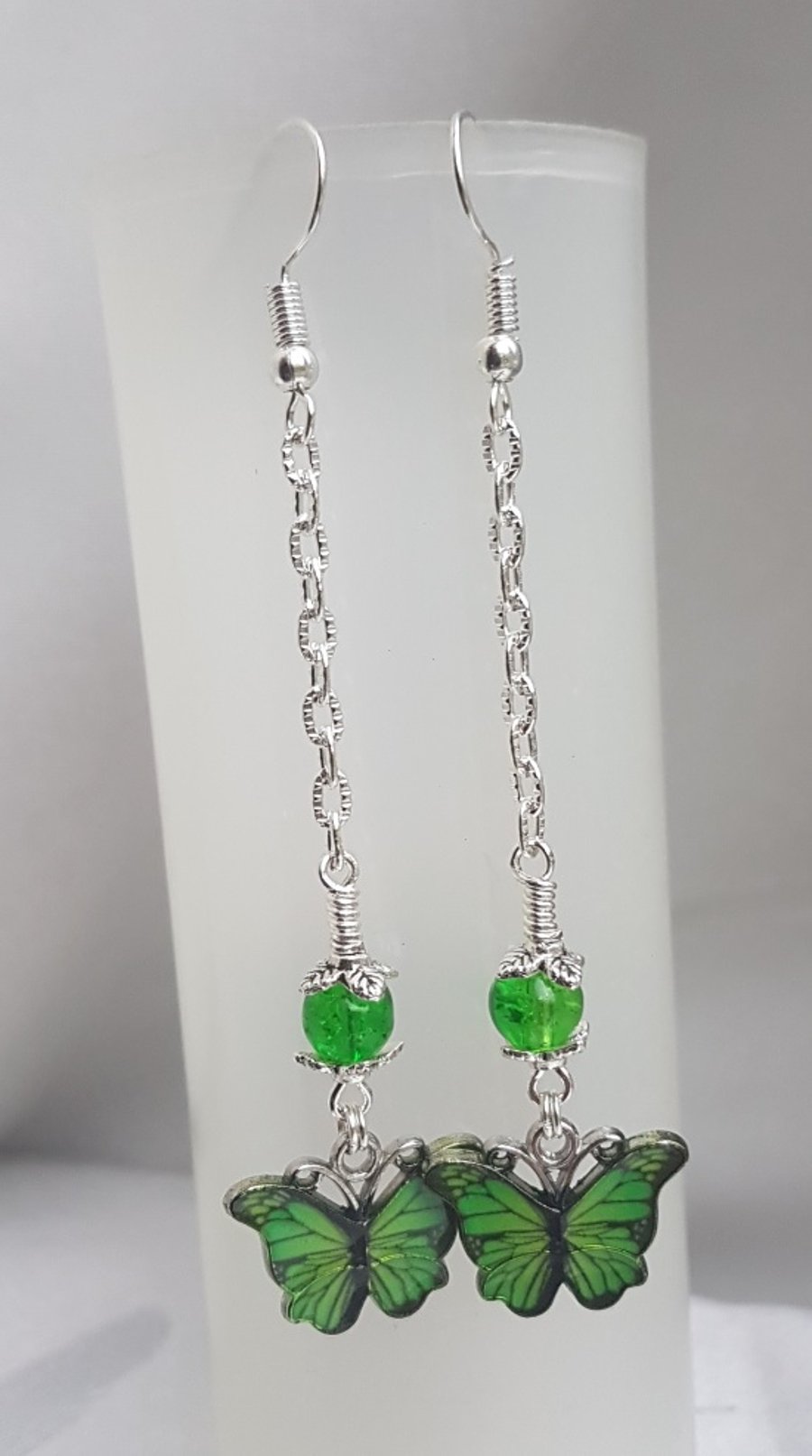 Gorgeous Dangly Green Butterfly Earrings - Silver Tones.