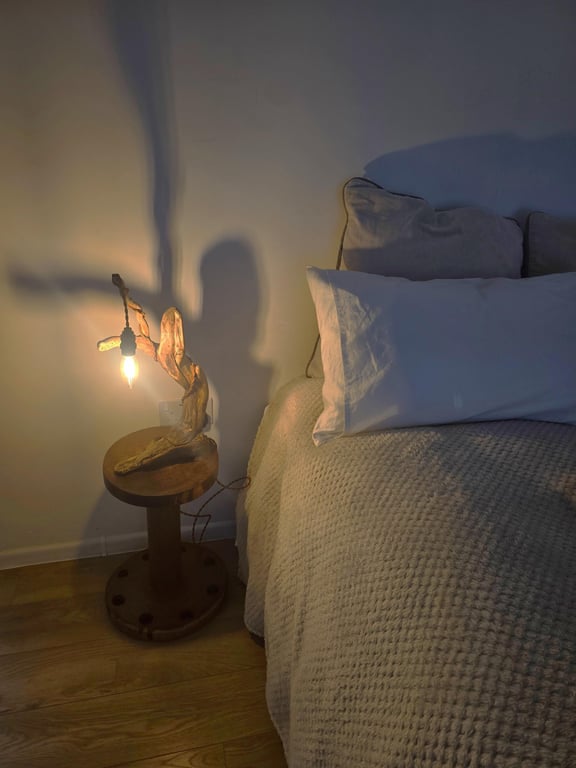 Rustic flowing wooden bedside lamp