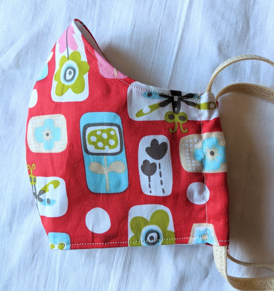 Cotton face mask with flower and insect print