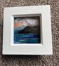 Orange Sunset over cliffs and sea needle felt  white box frame 