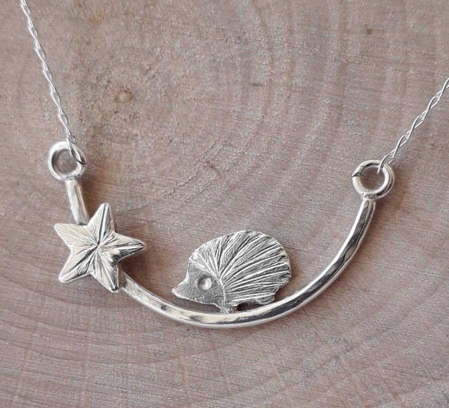 Silver sparkle hedgehog Necklace , hedgehog on a branch with a star 
