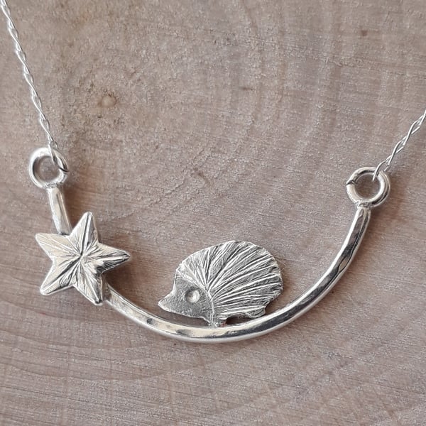 Silver sparkle hedgehog Necklace , hedgehog on a branch with a star 