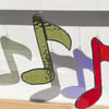 Stained glass musical note hanging suncatcher