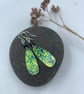 Lime green aluminium cow parsley drop earrings with blue bead