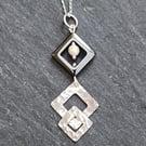 Double diamond sterling silver shapes with haematite pendant