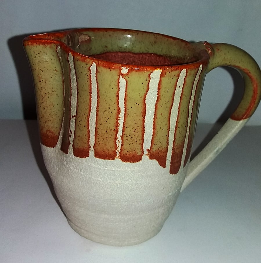 A delightful stripy glazed jug