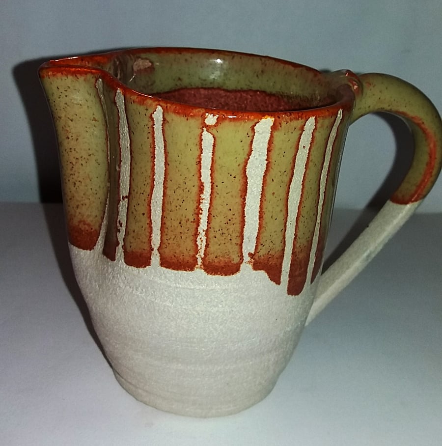 A delightful stripy glazed jug