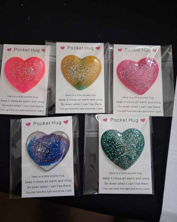 Glittery pocket hugs. Handmade epoxy resin heart.