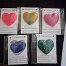 Glittery pocket hugs. Handmade epoxy resin heart.