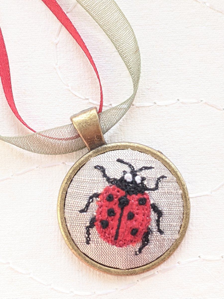 Ladybird embroidered necklace pendant