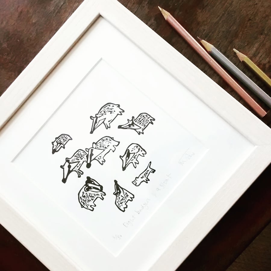 Eight Badgers and a Stoat - lino print
