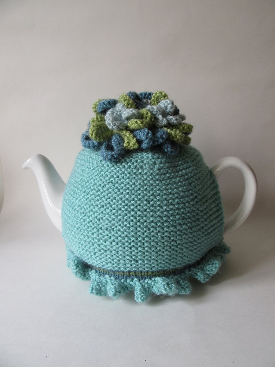 Tea cosie Tea cosy - Aqua with whirly - twirly flowers