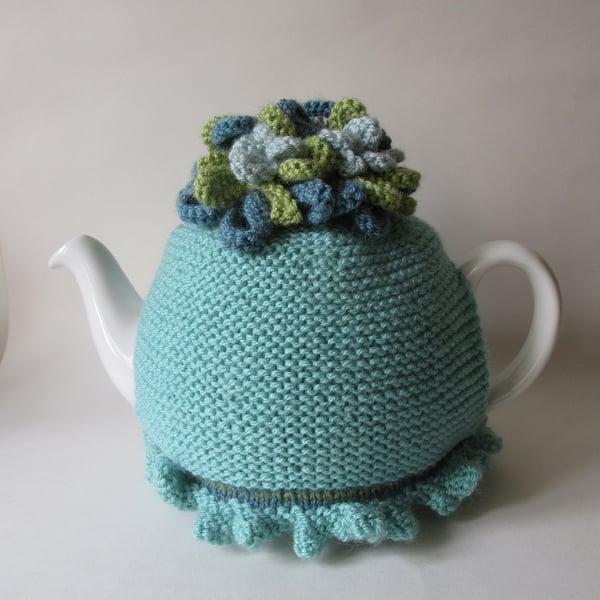 Tea cosie Tea cosy - Aqua with whirly - twirly flowers