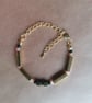 Green and peach, tea bracelet with gold. 