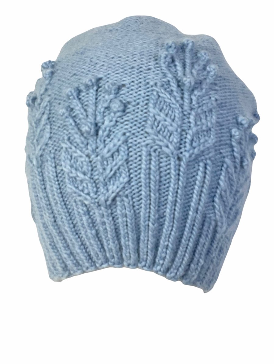 Hat with cables and bobbles in soft blue organic merino wool , slouchy cabled 