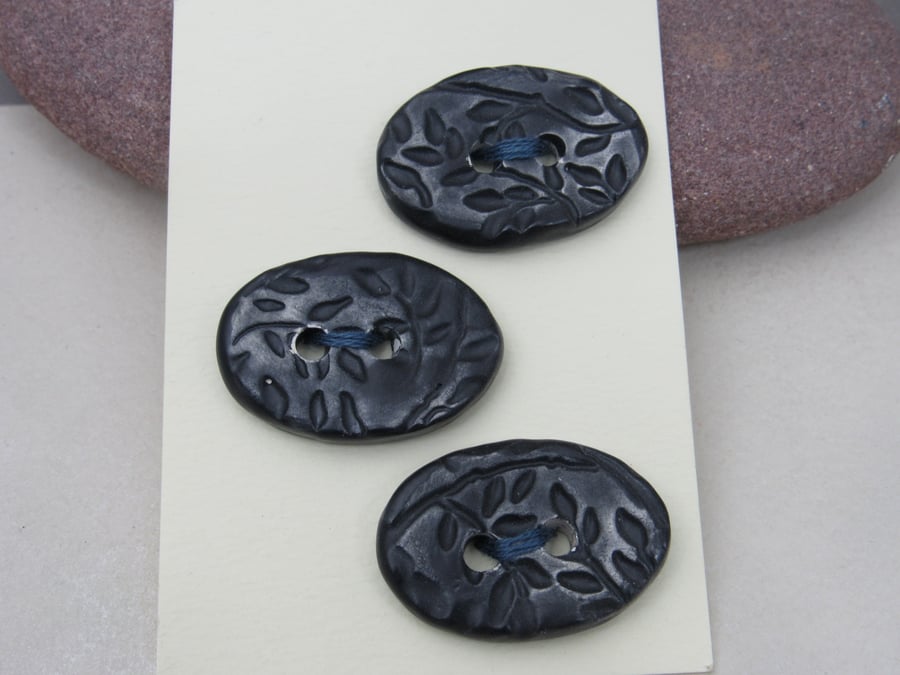 3 Medium Oval Coal Black Leaf Pattern Ceramic Buttons
