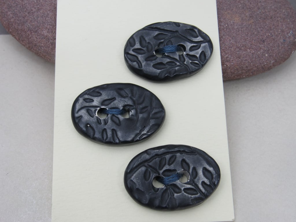 3 Medium Oval Coal Black Leaf Pattern Ceramic Buttons