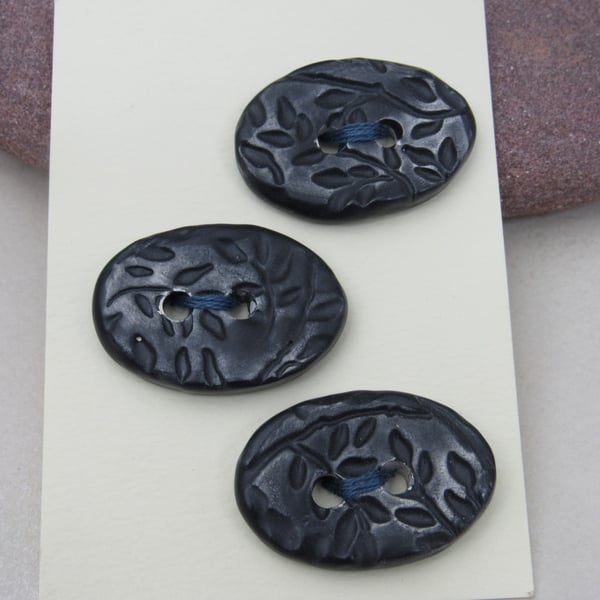 3 Medium Oval Coal Black Leaf Pattern Ceramic Buttons