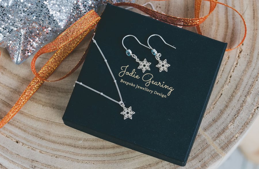 Hook Style Topaz and Sterling Silver Snowflake Earrings